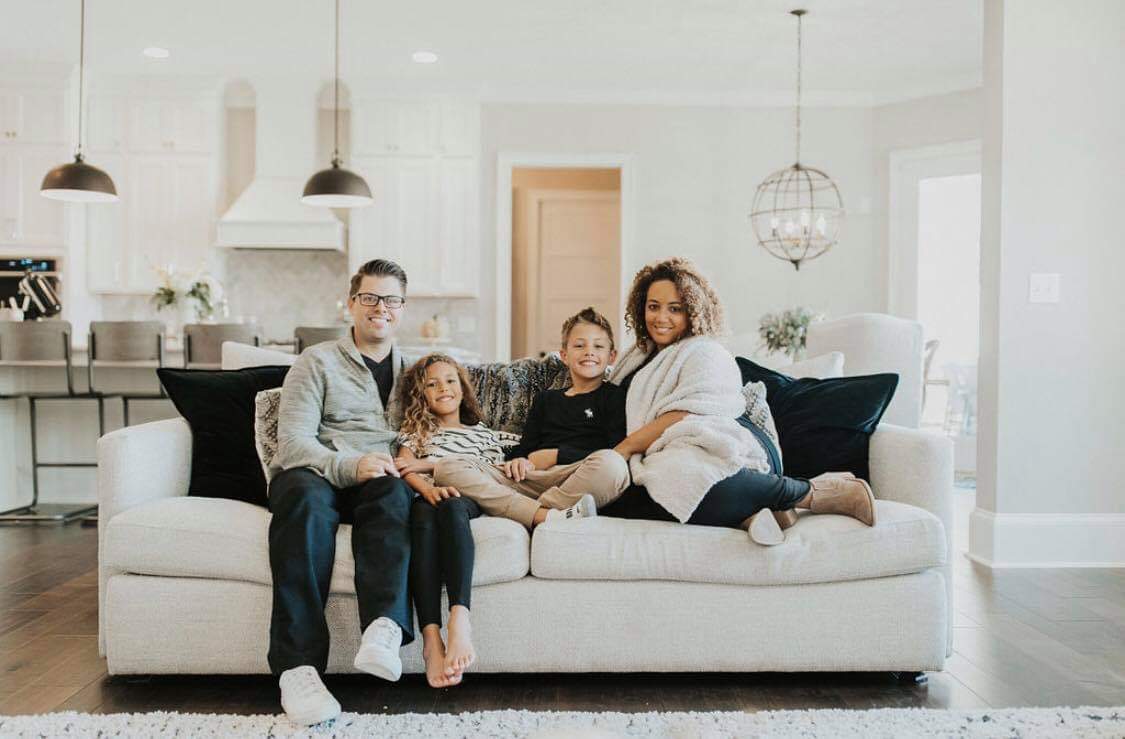 Image of family moved into a new home in Harrisburg.